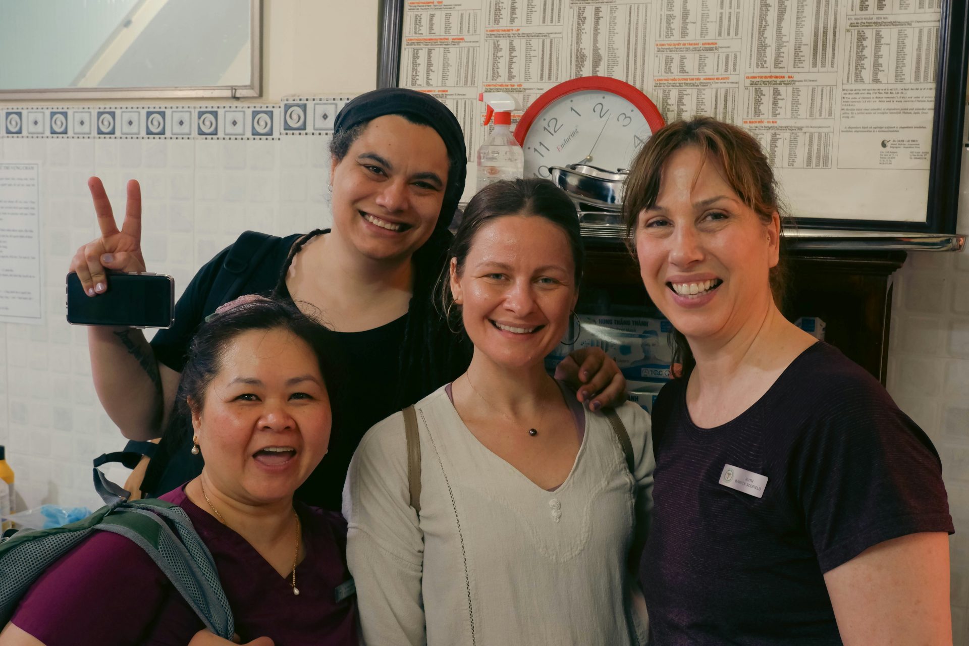 A group of women standing next to each other